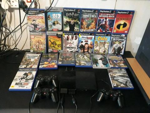 PS2 WITH 20 GAMES & 3 REMOTES