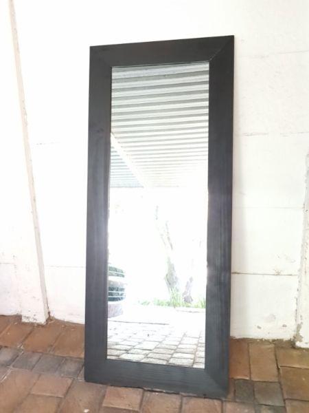 Large, framed mirror