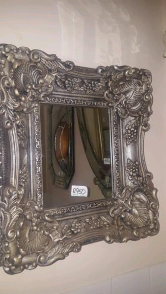 Very ornate framed mirror