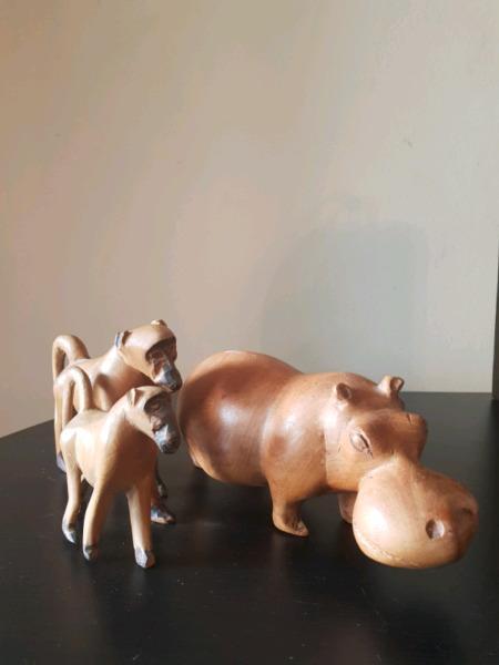 Wooden hippo and baboons decorations