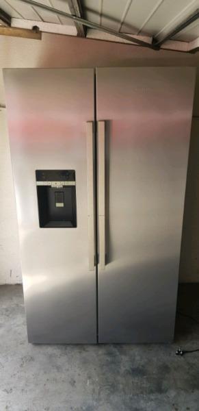 Grundig side by side fridge with ice and water dispenser
