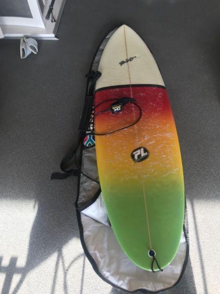 As new surfboard, leash, fins and bag
