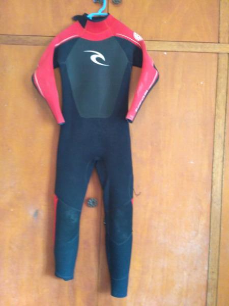 2x wetsuits for sale