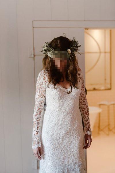 Guipure lace wedding dress designed by Robyn Roberts