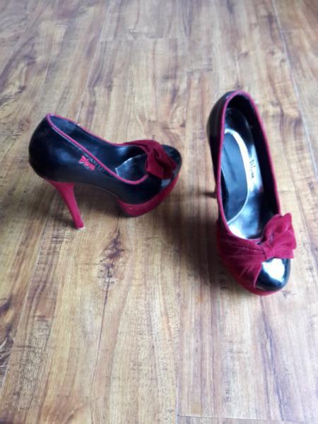 Red and black plum heels