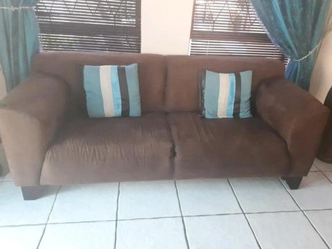 Solid brown suede couch & cupboard R850