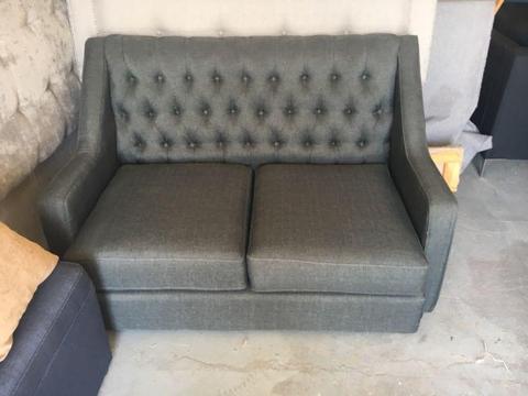 One by two seater couch dark grey fabric
