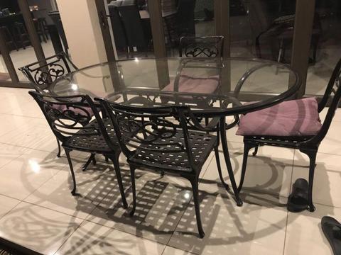 Six Pice Iron orin set with glass table and six chairs