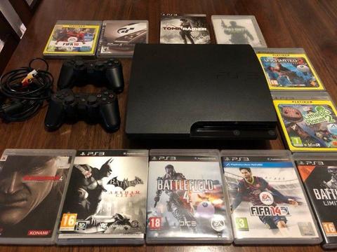 Playstation 3 with wireless controllers and 11 games