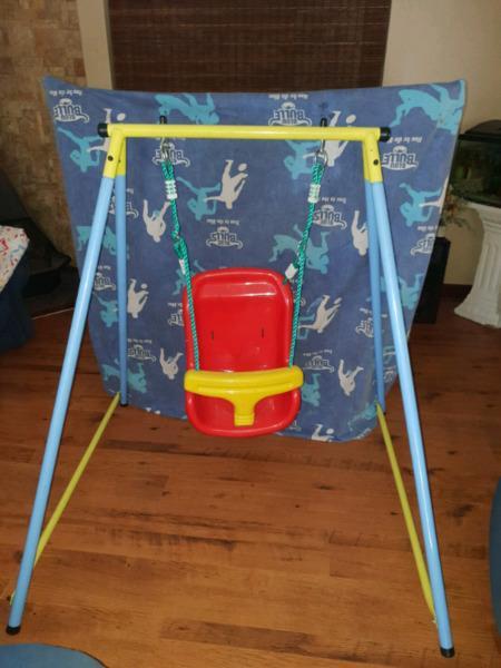 Baby swing with frame