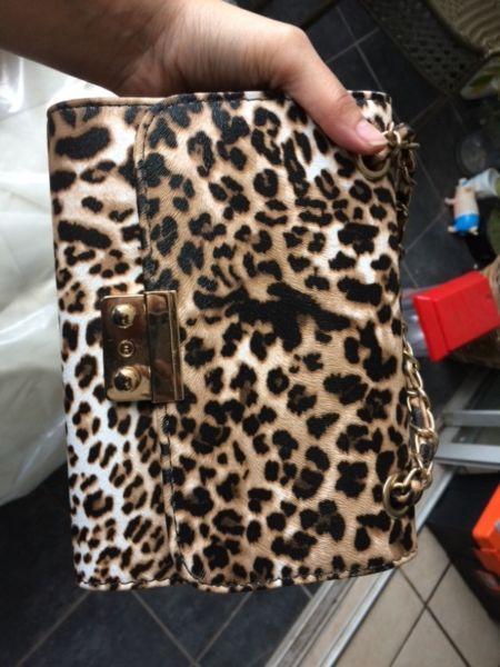 Leopard print handbag with chain detail