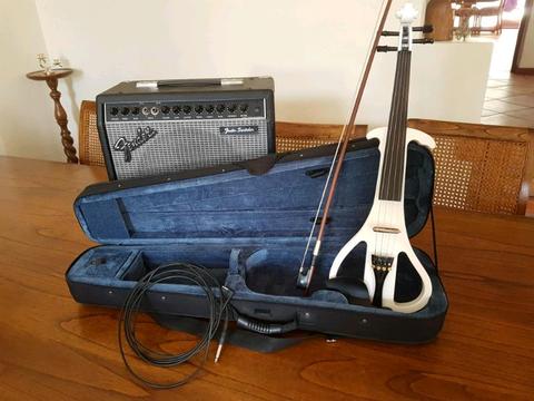 White electric violin and amp