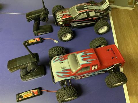 2 rc monster trucks with spare batteries