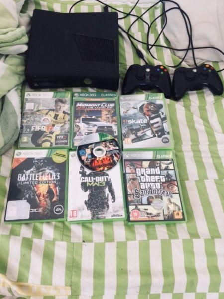 Xbox 360 for sale with 7 games and two controls