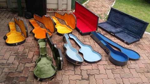 R2000 for a bunch of vintage guitar cases, I have no idea what guitars fit. Sold as is