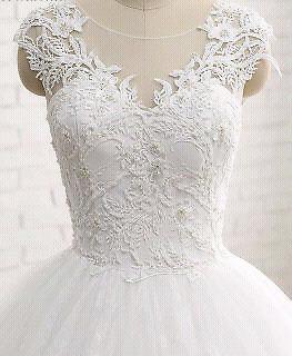 Beautiful lace ballgowns for hire Includes lace veil