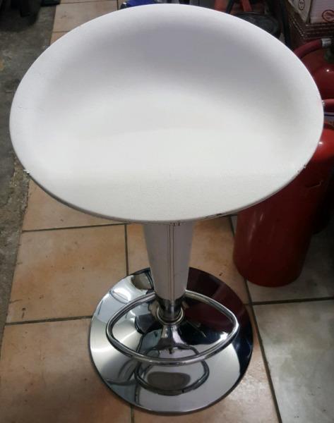 White and chrome bar stools with broken adjustable arm