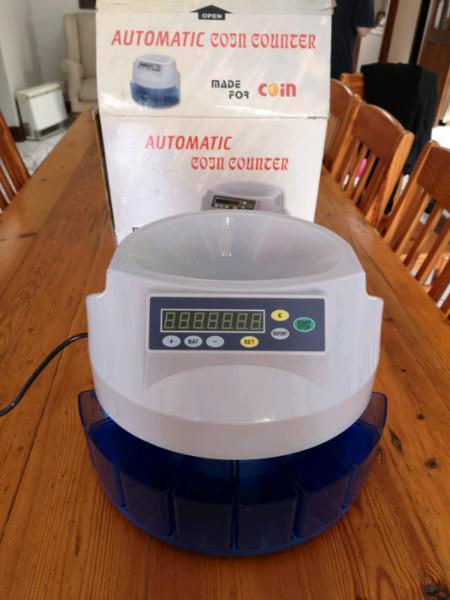 Coin counting machine asking R2500