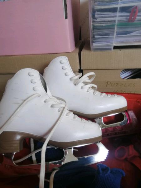 Ice skates for sale still as good as new hardly worn with blade protectors