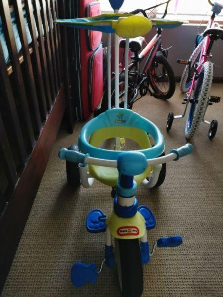 Blue tricycle for infant to toddler