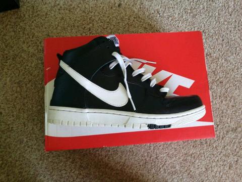 size 7 Nike dunk high tops black and white