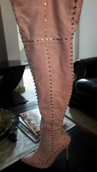 Pink thigh high boots