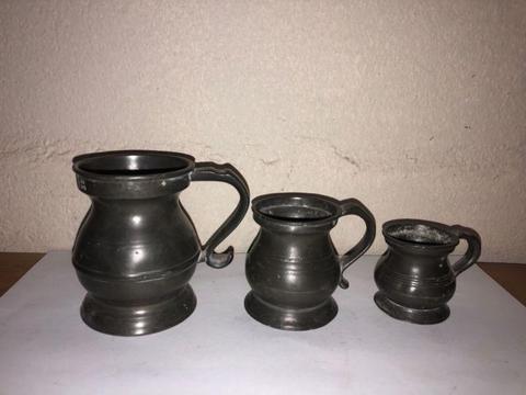 Pewter measuring cups