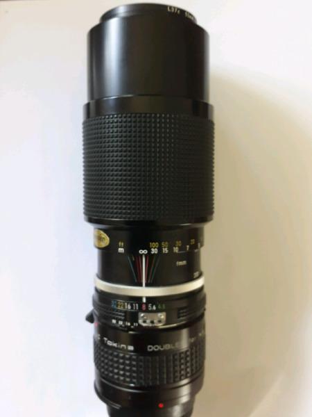 Nikon 80 mm to 200 mm with Tokina 2x converter