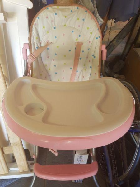 Pink baby feeding high chair