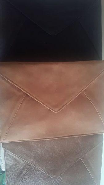 Leather custom made clutch