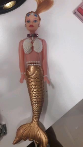 Seashell and pearl decorated mermaids