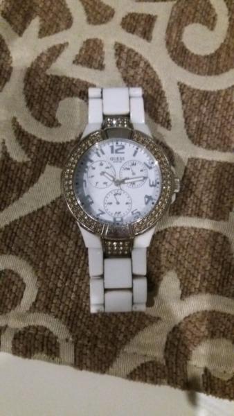 Guess ladies watch and I will give 2 free watches