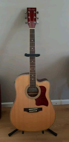 Acoustic guitar with pick up and tuner and stand