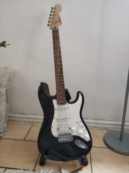 Fender Squier Bullet Strat with Stand and Leather Strap