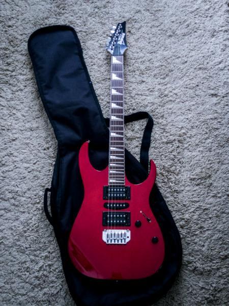 Ibanez Electric Guitar with Roland Amplifier and Effects Pedal