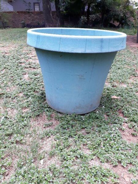 Large green plastic garden pot