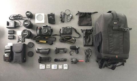 Nikon D7100 and Coolpix P7000 with various lenses and complete kit