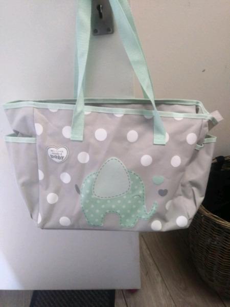 Baby bag and changing clutch