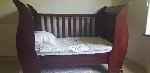 Mahogany sleigh cot (with front panel), chest of drawers and three tier take it all. Sold as set