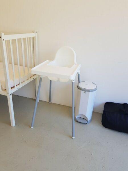 White highchair and korbell nappy bin