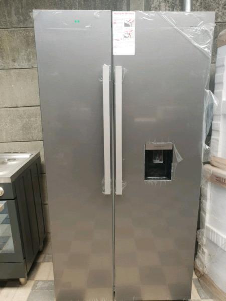 Stainless steel defy side by side fridge freezer still new