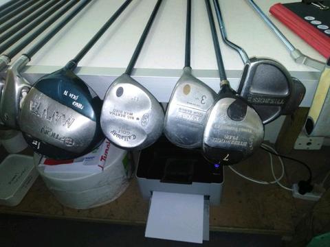 Various golf clubs + bag