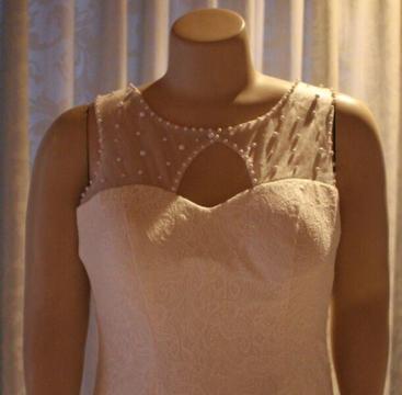 Wedding Dress - new, size 38 with lace and sheer top