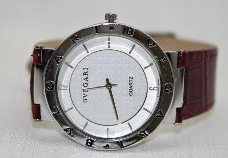 A stylish Bulgari inspired womens wrist watch, with a stainless steel case