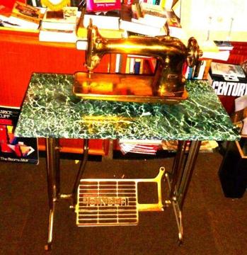 Gold-Plated (Style) Sewing Machine (on marble table)