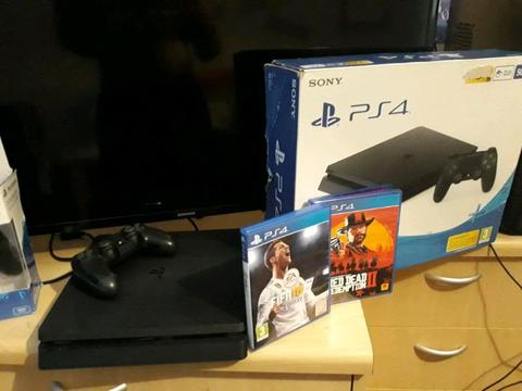 PS4 500GB - 2 games, 2 controllers. Mint condition!