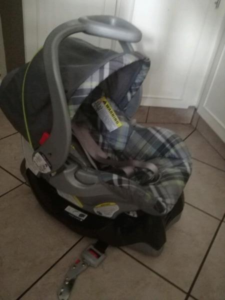 Baby Trends car seat with a base