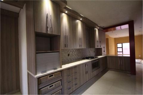 CUSTOM MADE KITCHEN AND BEDROOM CABINETS