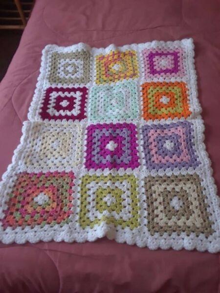 Colourful crochet baby's blanket