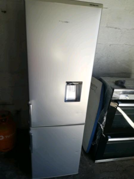 beautifull hisence frige and freezer silver matalic water dispenser
